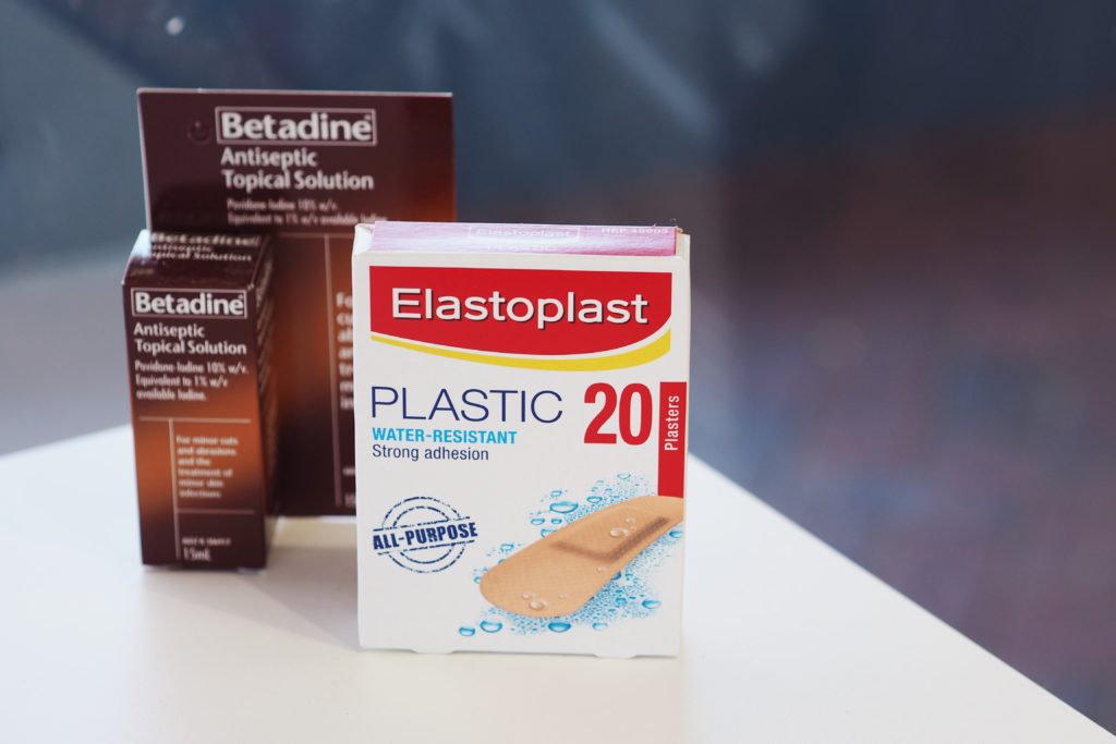 Photo of bandaids and betadine