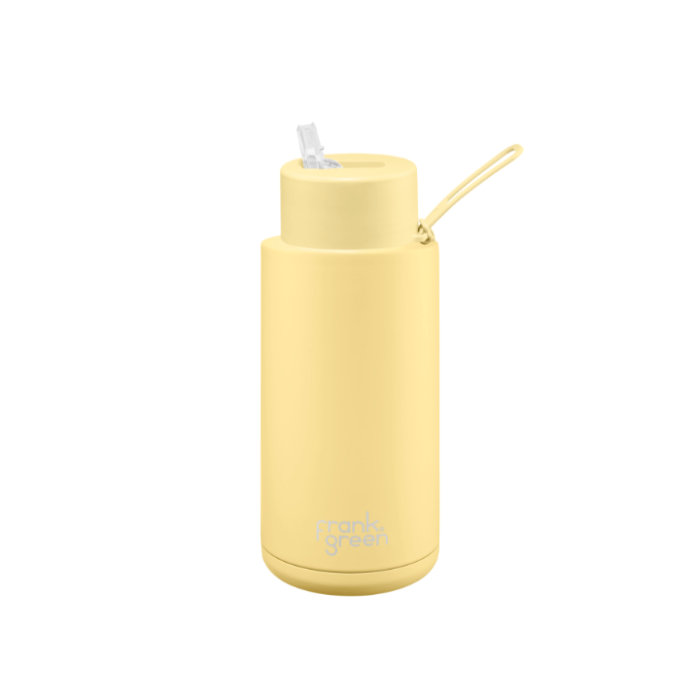 A ceramic 34oz straw bottle in yellow