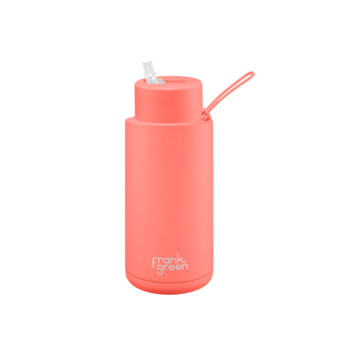 A ceramic 34oz straw bottle in coral