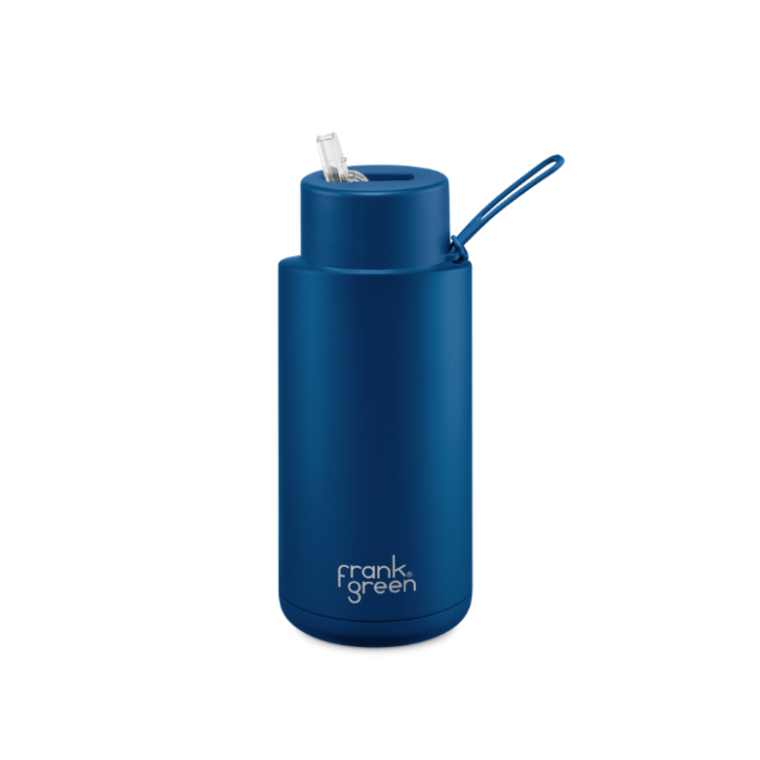 A ceramic 34oz straw bottle in blue