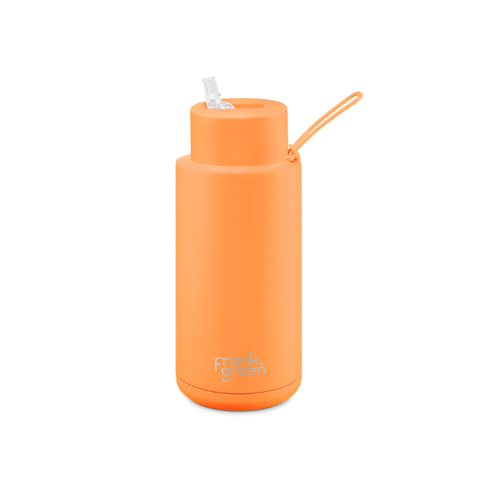 A ceramic 34oz straw bottle in neon orange