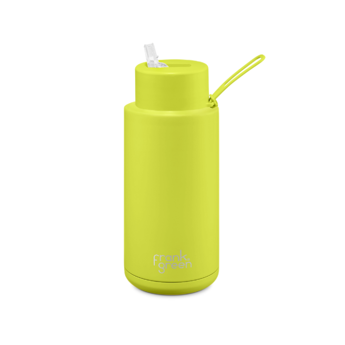 A ceramic 34oz straw bottle in neon yellow